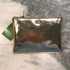 Brand new Kate Spade gold mini pouch